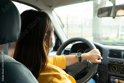 Woman driving car, ensurance car