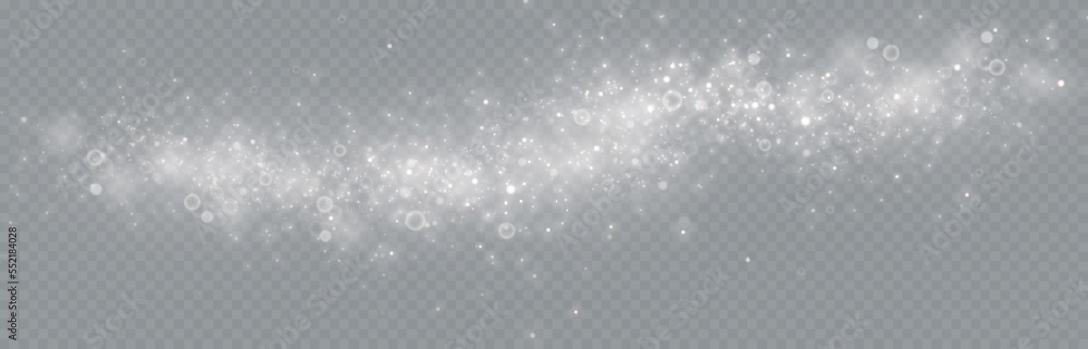 Particles of white magic dust. Shining light particles.Christmas glitter particles. Light effect on a transparent background Particles of white magic dust. Shining light particles.Christmas glitter particles. Light effect on a transparent background