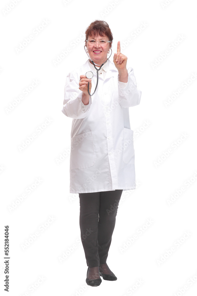 Mature woman doctor with stethoscope in ears and checking listening heart pulse pose Mature woman doctor with stethoscope in ears and checking listening heart pulse pose