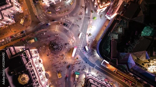 Aerial Drone Top Down Timelapse of London UK Piccadilly Circus Regent Street and Leicester Square at Rush Hour Cars And Double-Decker Bus Driving  photo