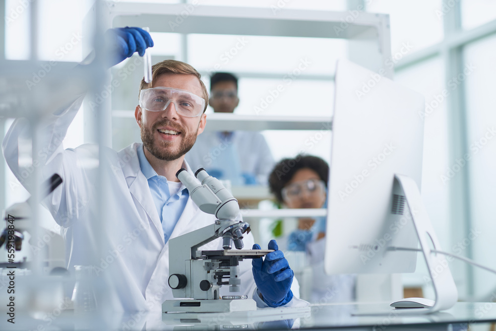 In a Modern Laboratory Research Scientist Conducts Experiments In a Modern Laboratory Research Scientist Conducts Experiments