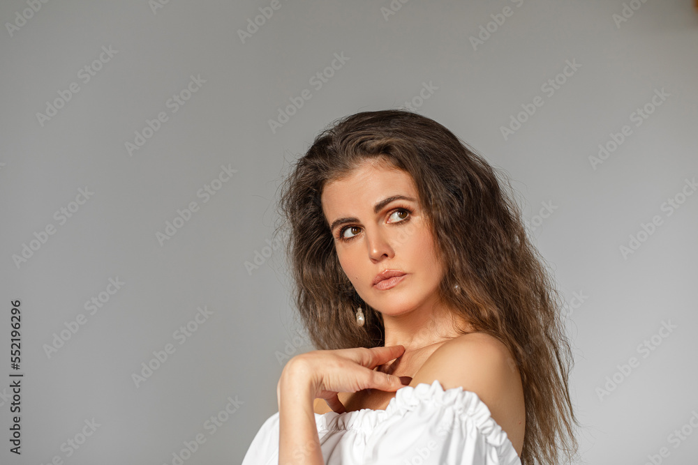 Pensive beautiful brunette girl in studio. Pensive beautiful brunette girl in studio.
