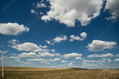 beautiful landscape of blue sky with clouds and field in Ukraine