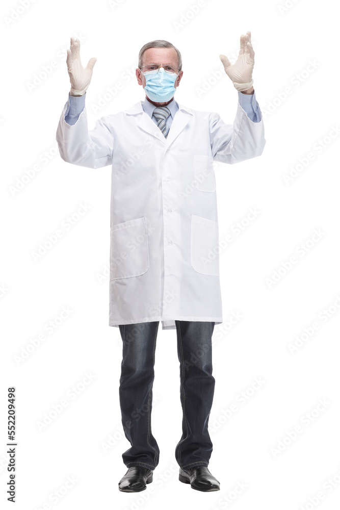Side view of mature chemist holding up beaker of red chemical in the laboratory Side view of mature chemist holding up beaker of red chemical in the laboratory
