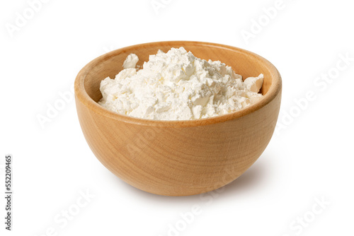 Flour in wooden bowl isolated on white background 
