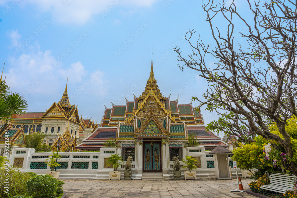 The gate with background of Dusit Maha Prasat and Chakri Maha Prasat before the exit of Grand palace Bangkok Thailand