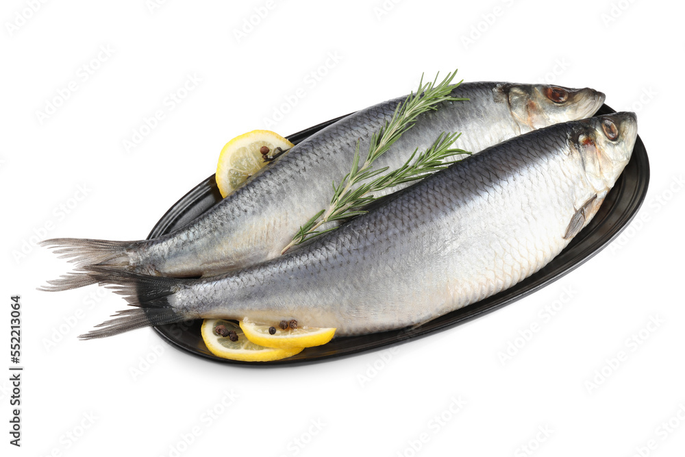 Plate with salted herrings, slices of lemon, peppercorns and rosemary isolated on white