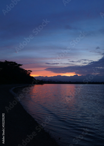 Amazing sunset at pemuteran beach, bali, indonesia. photo