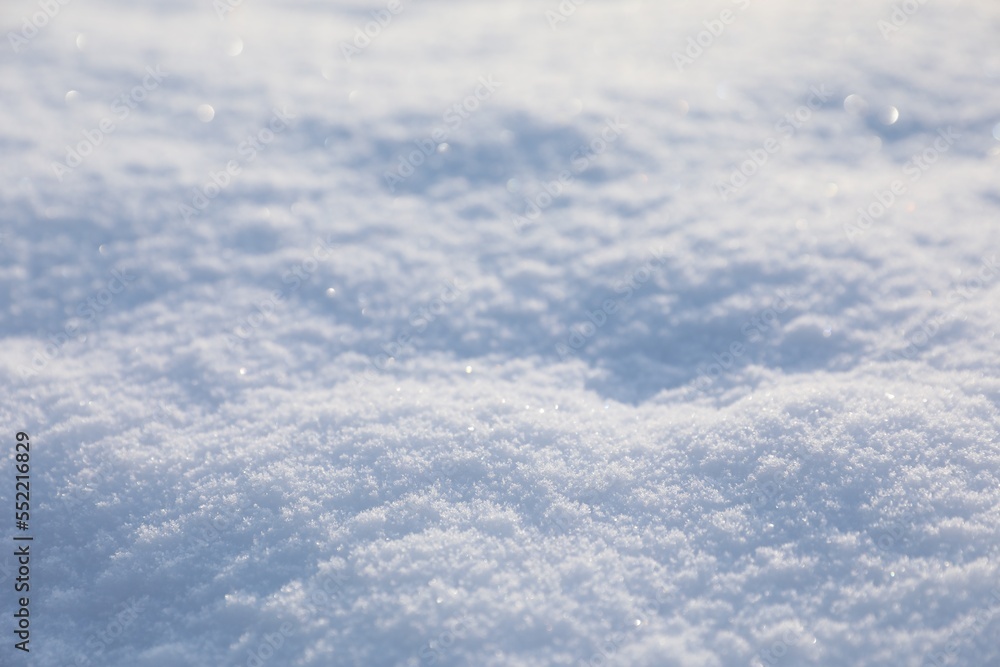 Fototapeta premium Beautiful white snow as background, closeup view