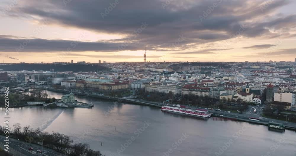 Sunrise at Prague old town and new town from drone, city with river and bridge traffic ship on the water skyline Sunrise at Prague old town and new town from drone, city with river and bridge traffic ship on the water skyline