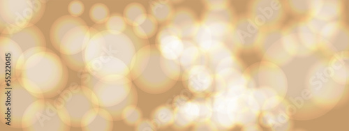 Abstract golden bokeh background. Holiday concept and celebration background for New Year  Anniversary  Wedding  Birthday and many more. Abstract bokeh lights background. Defocused bokeh blur lights.