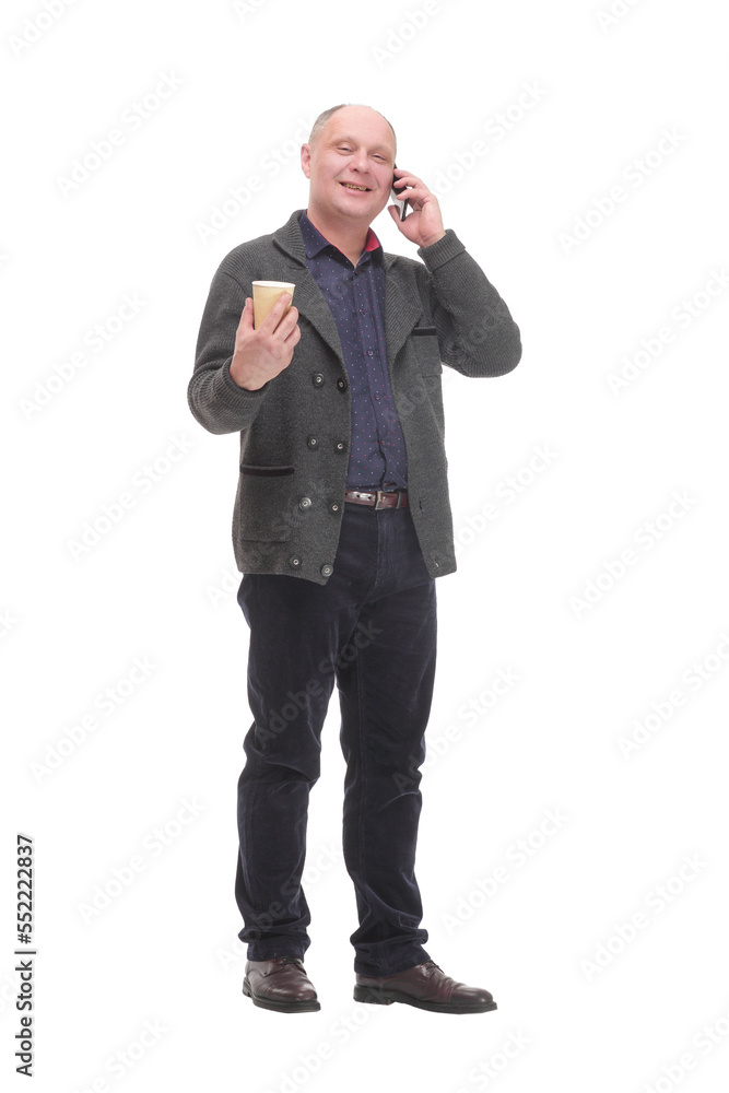 mature smiling man with smartphone and coffee to take away.