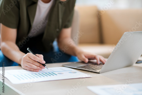 Close up of Businesswoman working at office using laptop.