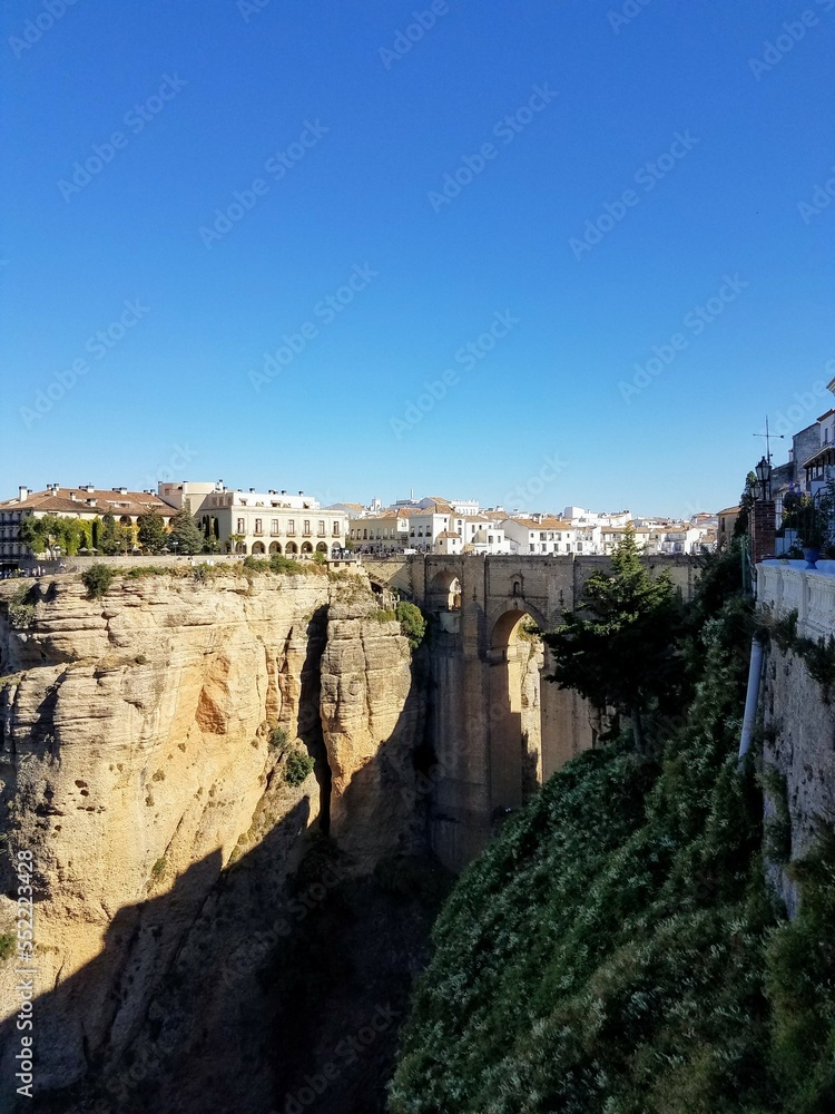 The Town of Ronda set on the Cliffs and Ancient Bridge in the Andalusian Region of Spain