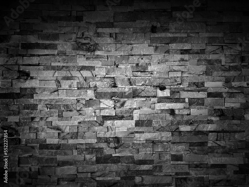Old vintage retro style dark bricks wall for abstract brick panorama background and texture.