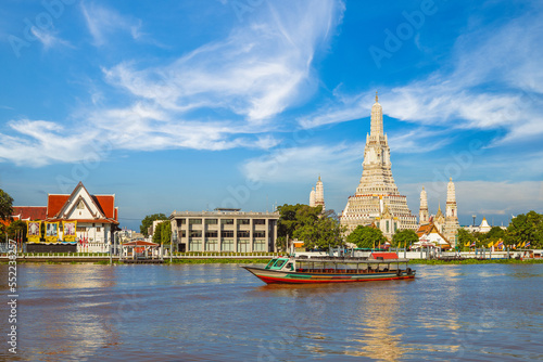 Wat Arun by Chao Phraya River at Bangkok, thailand photo