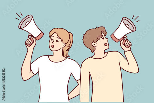 Man and woman use loudspeaker to invite everyone to event or make important announcement. Guy and girl are shouting loudly turning in different directions trying to spread word. Flat vector design  photo