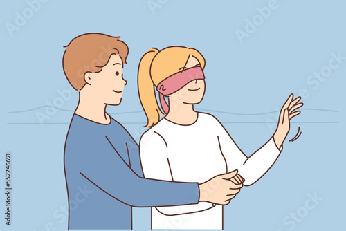 Man blindfold woman make surprise 