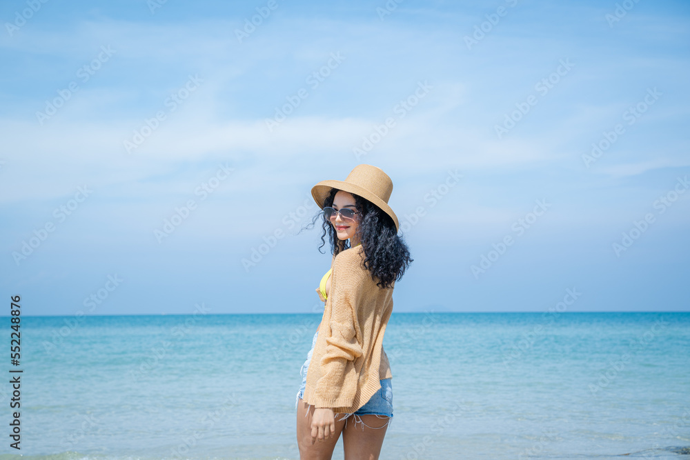 Pretty slim girls at tropical sea beach,Enjoy and fun outdoor activity lifestyle on holiday travel vacation at the sea.