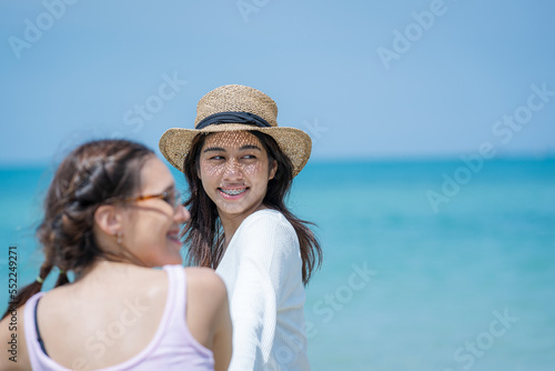 Group of friends having fun at the beach on holidays,Holiday in summer,Concept vacation.