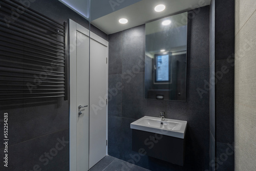 Bathroom interior with glass shower cabin