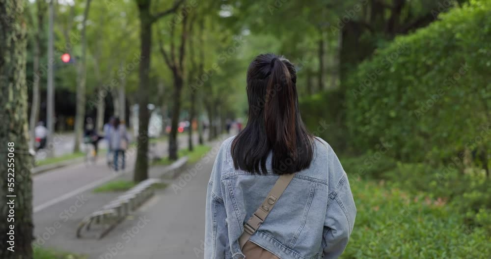 Woman walk in the street