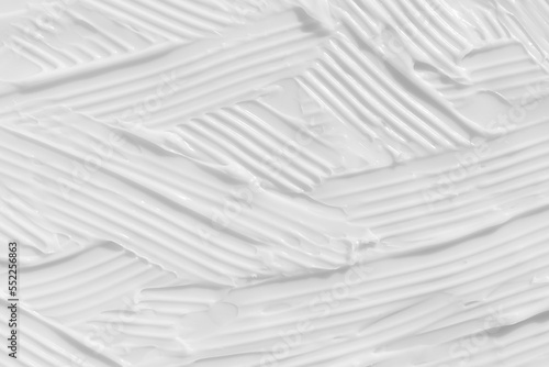 The texture of the white cream. Cosmetic background. Cosmetic product for body care. Wellness and beauty concept.