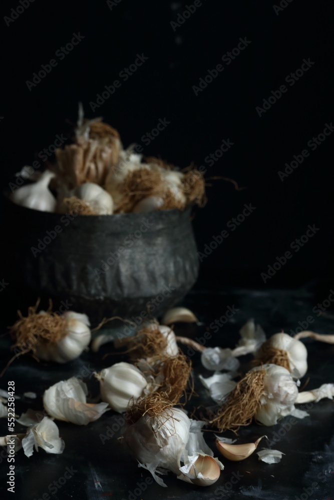 Group of garlics on a black background Group of garlics on a black background