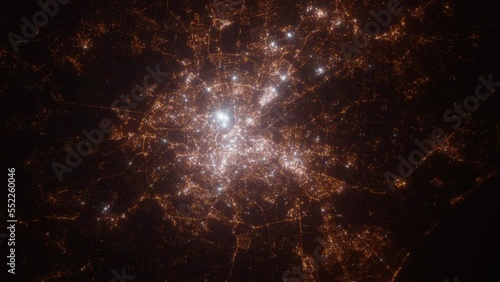 Rome (Italy) top view at night. Top view on modern city with street lights and glow effect. Camera is zooming in, rotating clockwise. Vertical video. The north is on the left side