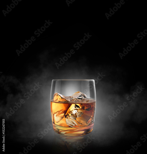 Glass of whiskey on black background with smoke. 3d render