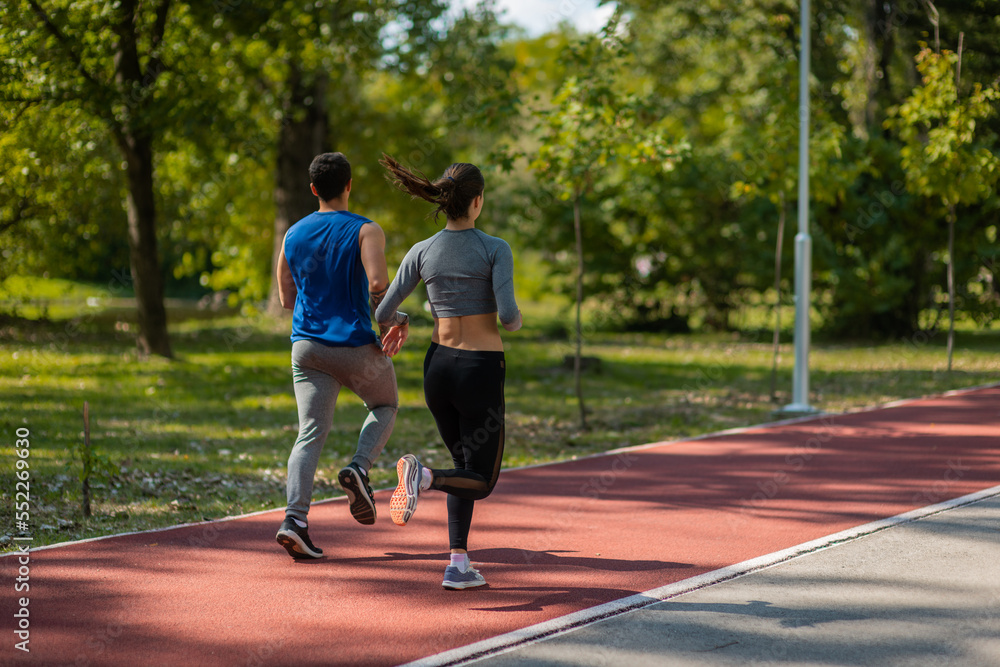 A tired couple slowed down their running tempo