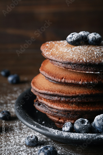 Concept of sweet food, chocolate pancakes, close up