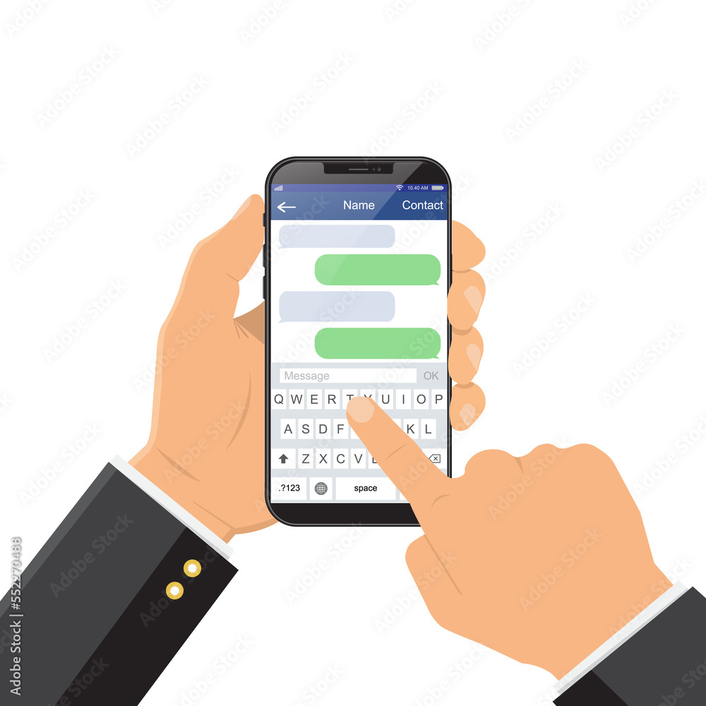 Chat message on the smartphone screen. Hand holds the smartphone, finger touches screen Chat message on the smartphone screen. Hand holds the smartphone, finger touches screen