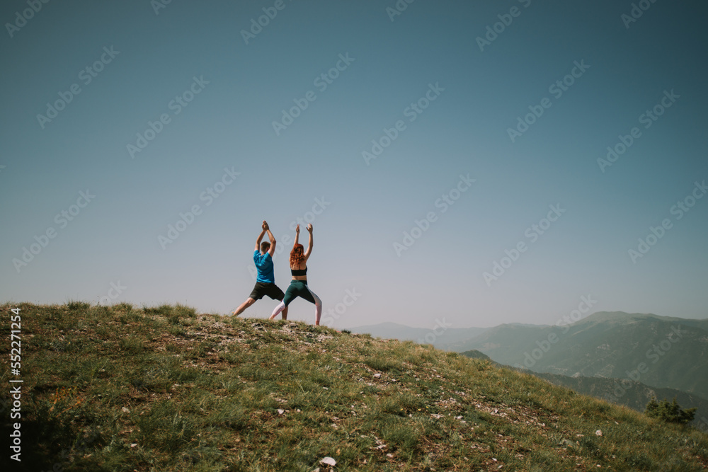 Yoga on the top of the mountain