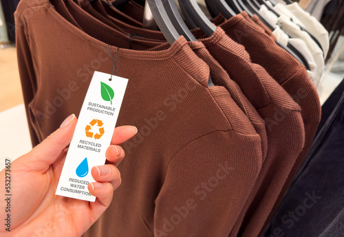 Sustainable fashion label, concept of using recycled materials in fashion industry photo