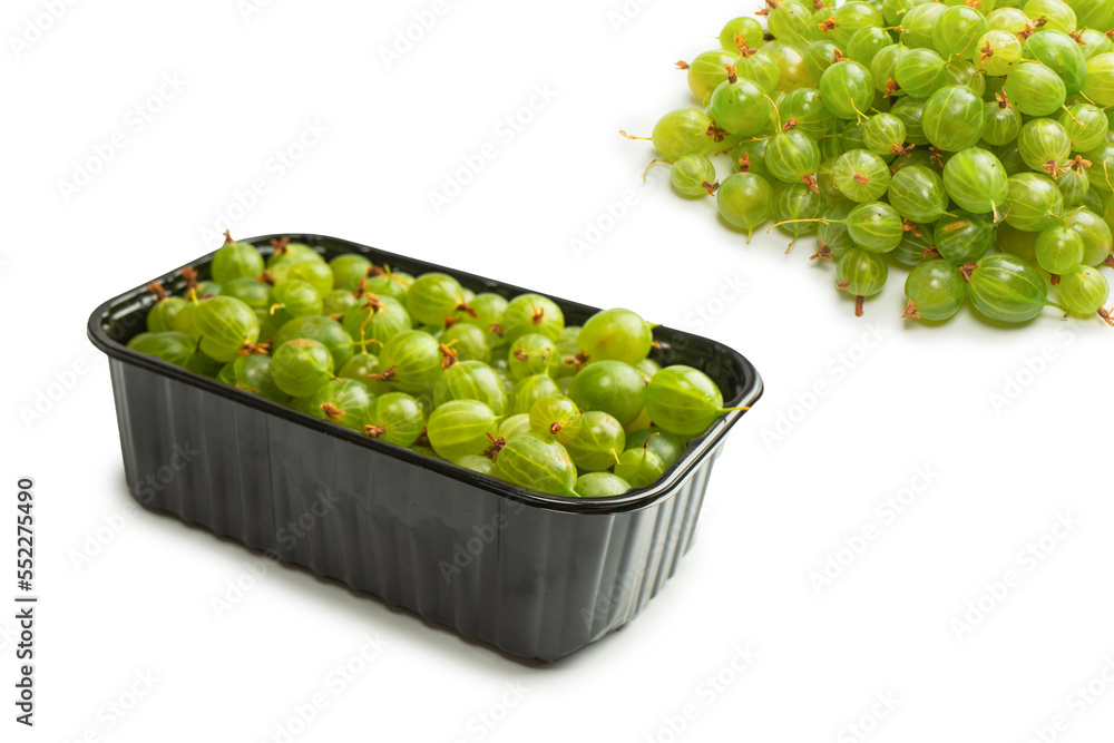 A group of gooseberries isolated on a white background. A group of gooseberries isolated on a white background.