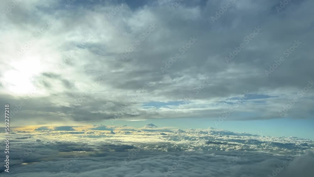 Aerial view, pilot point of view, from a jet cockpit during cruise level with a cold winter sky. 4k Aerial view, pilot point of view, from a jet cockpit during cruise level with a cold winter sky. 4k