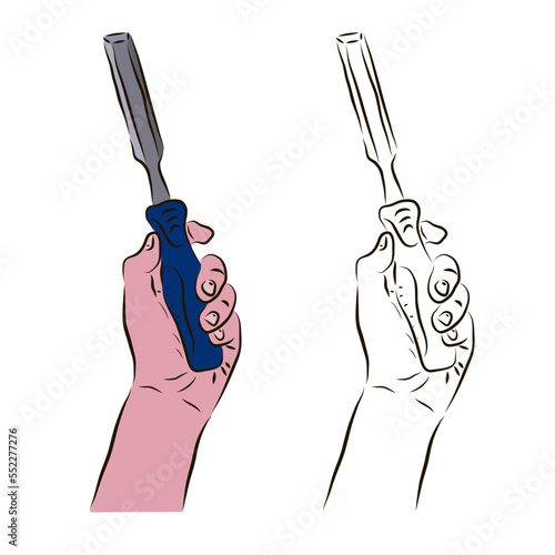 The hand holds a chisel for woodwork. The concept of the carpenter's work.