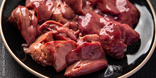 raw chicken liver offal meal food snack on the table copy space food background rustic top view photo