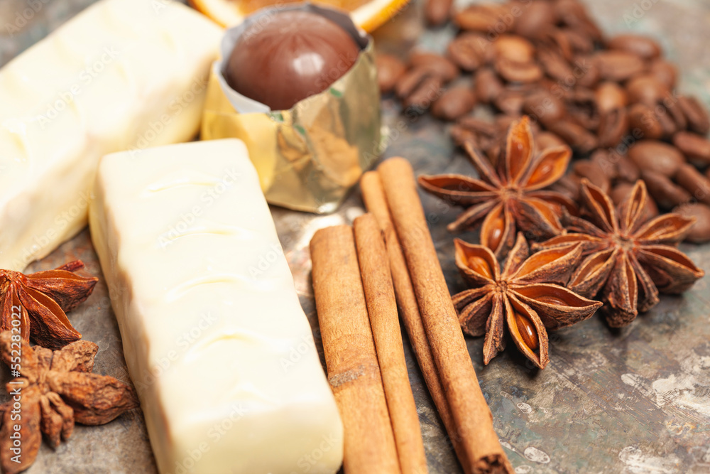 Fototapeta premium White chocolate candies with anise,cinnamon sticks,coffee beans.