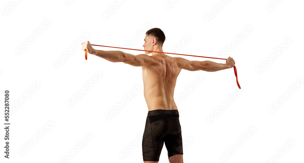 Back view of muscular young man doing excersice with expander rope isolated over white background. Sport, fitness, healthy and active lifestyle concept Back view of muscular young man doing excersice with expander rope isolated over white background. Sport, fitness, healthy and active lifestyle concept