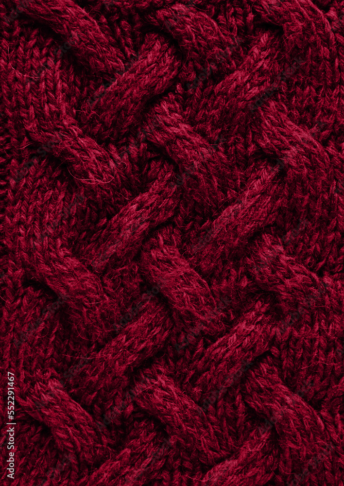 Texture of smooth knitted sweater with pattern. Handmade knitting wool or cotton fabric texture. Background of Large knit pattern with knitting needle or crochet. Color Of The Year 2023 - Viva Magenta