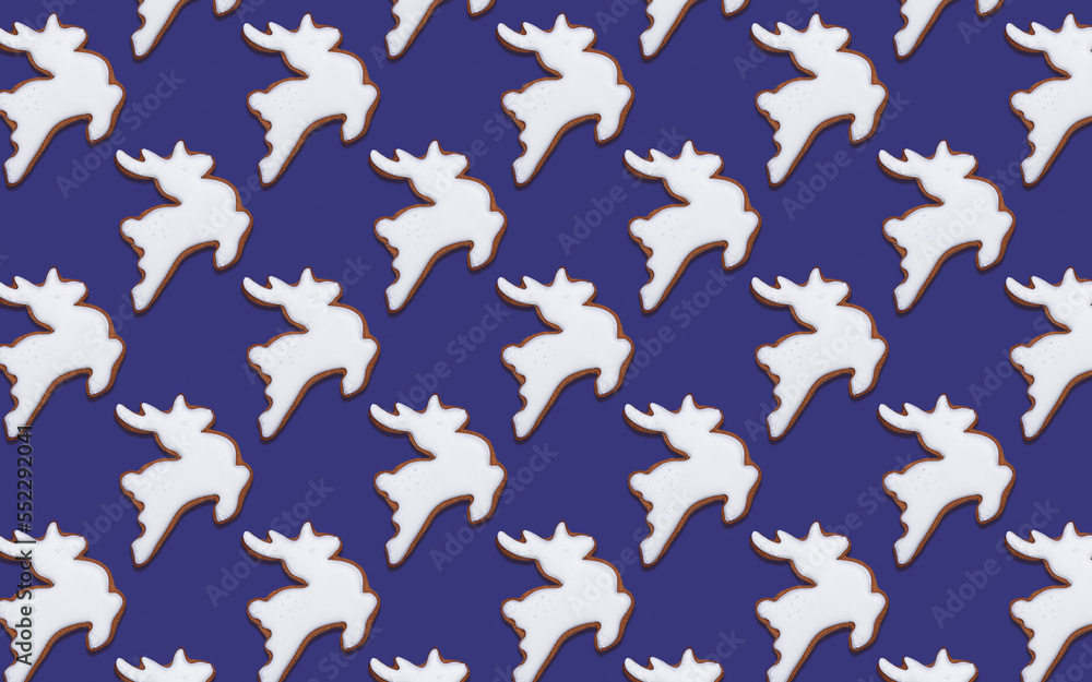 Seamless pattern of cookies in the shape of White deer, on a purple background, minimal print for new year card. Happy new year and merry christmas concept Seamless pattern of cookies in the shape of White deer, on a purple background, minimal print for new year card. Happy new year and merry christmas concept