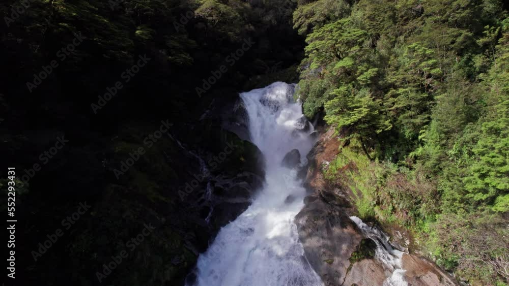 Aerial flying towards Roaring Billy Falls 2 in Haast, West Coast, New Zealand Aerial flying towards Roaring Billy Falls 2 in Haast, West Coast, New Zealand