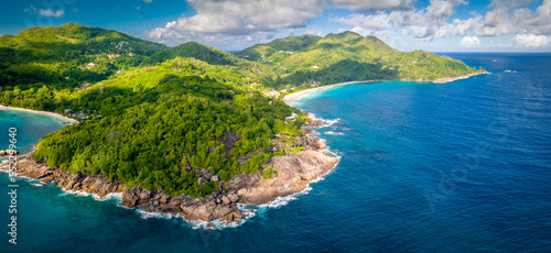 Aerial view of beautiful tropical paradise beach Anse Intendance at Seychelles, Mahe. Stone coast in the Seychelles
