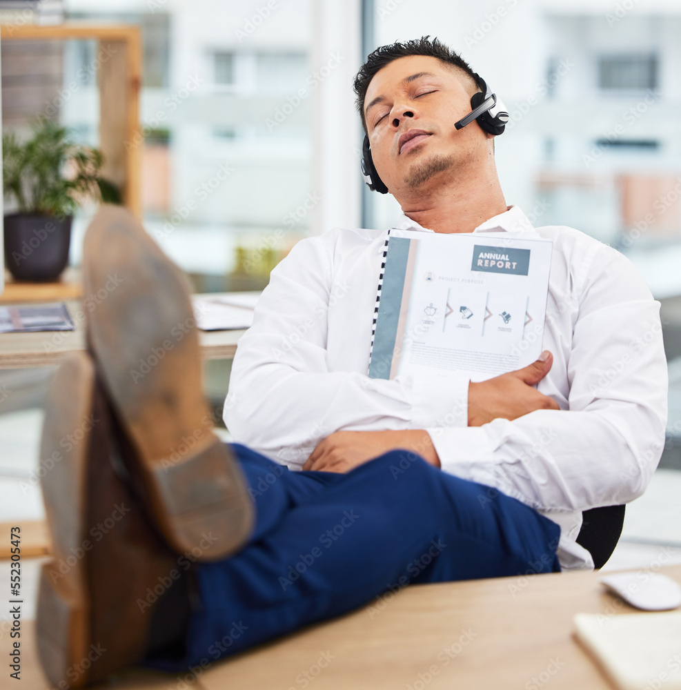 Sales man, sleeping and headset at office desk from reading annual report documents, finance paperwork or taxes. Nap, burnout and tired financial consultant exhausted from business economy consulting Sales man, sleeping and headset at office desk from reading annual report documents, finance paperwork or taxes. Nap, burnout and tired financial consultant exhausted from business economy consulting