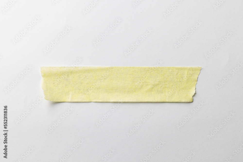 Yellow masking tape and copy space on white background Yellow masking tape and copy space on white background