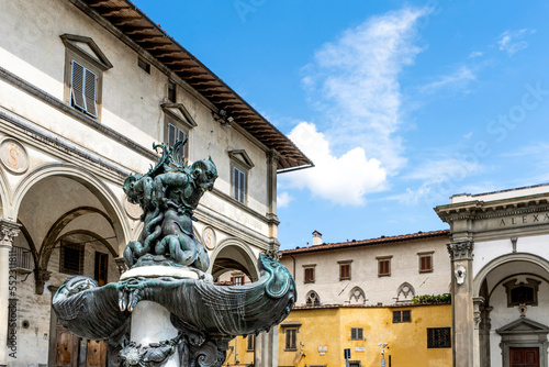 The bronze fountain depicting a sea monster, designed by sculptor Pietro Tacca in 17th century, in SS. Annunziata square, Florence city center, Tuscany region, Italy