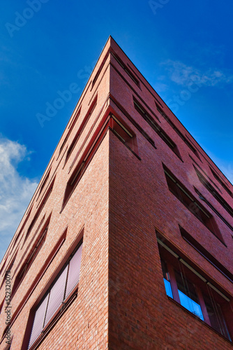 a red brick house in germany, Leipzig with blue sky