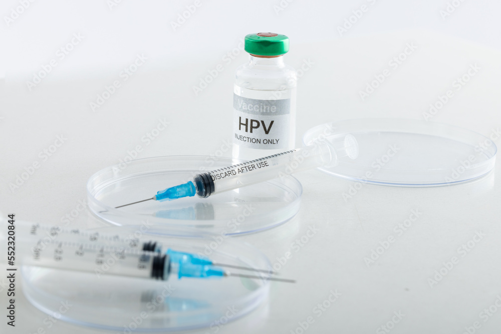 Composition of hpv vaccine vial and syringes on white background with copy space